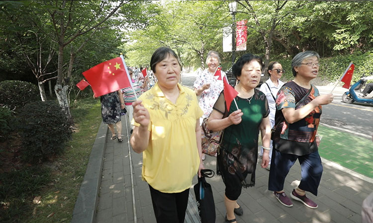 玄武門(mén)街(jiē)道(dào)“快(kuài)閃活動”拍(pāi)攝花(huā)絮
